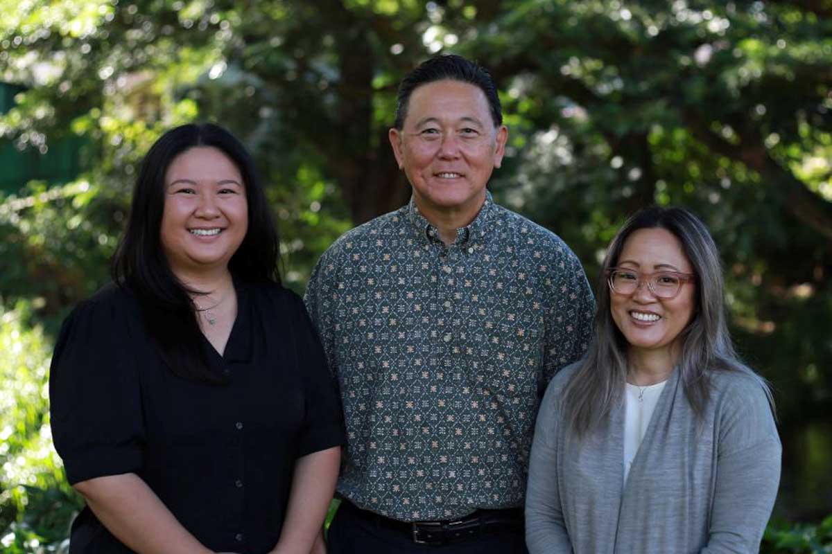 Dr. Tracie Inouchi, Dr. Sherry Wong, and Dr. Daniel Yamamoto, optometrists at Simply Eyes Hawaii in Honolulu